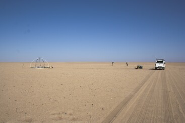 NPL scientists measuring the reflectance and its spatial homogeneity at a candidate site for the RadCalNet site.